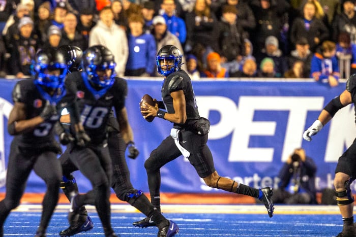 Nov 5, 2022; Boise, Idaho, USA; Boise State Broncos quarterback Taylen Green (10) rolls out to pass against the Brigham Young Cougarsduring the second half at Albertsons Stadium. Brigham Young won 31-28. Mandatory Credit: Brian Losness-USA TODAY Sports